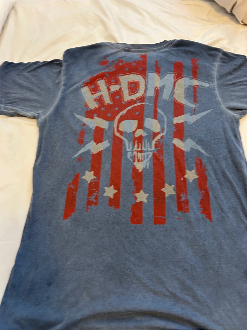 Mens Blue Graphic Tee with Red & White Flag Skull Design